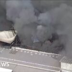 Massive column of smoke as fire engulfs Brazil shopping centre