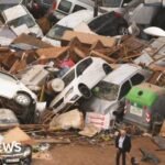 Drivers rescued after floodwaters cause chaos in Spain