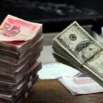 China’s yuan to hit record lows as U.S. tariff threat mounts, investment banks forecast