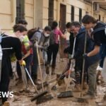 ‘Outpouring of unity in Spain as anger grows over slow response to floods’