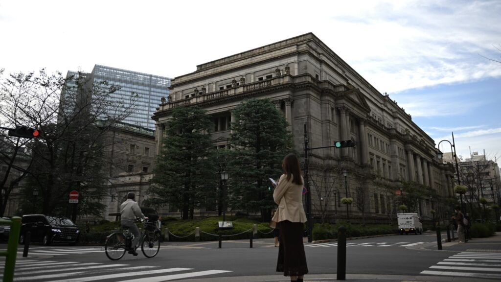 Bank of Japan holds rates at 0.25%, yen weakens to one-month low