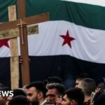 Protests erupt in Syria after Christmas tree set alight