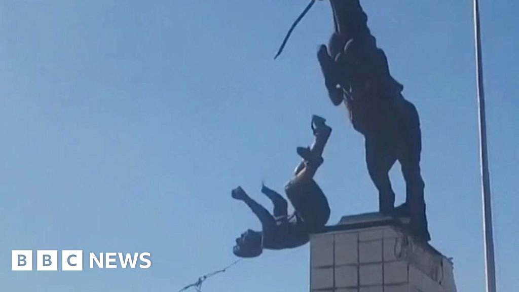 Statue of Syrian president's brother is torn down in Aleppo